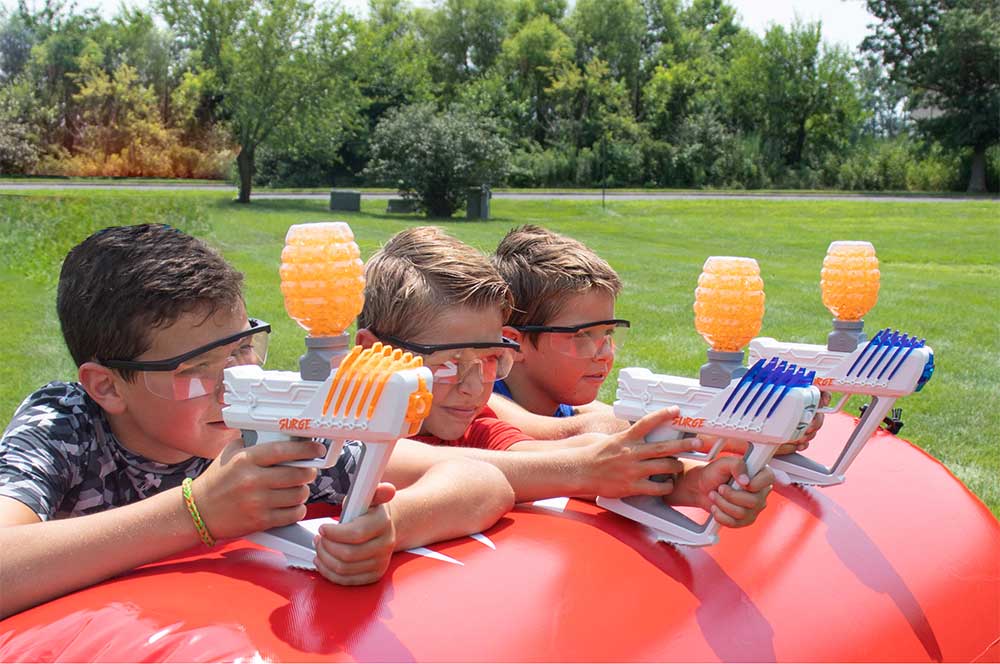 Airsoft player with laser on his airsoft rifle